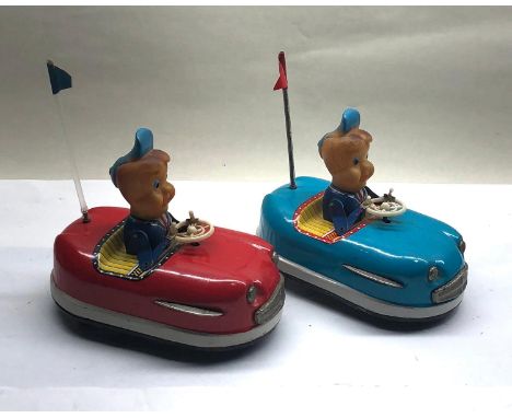 Pair of vintage wind up Japanese tin toys 