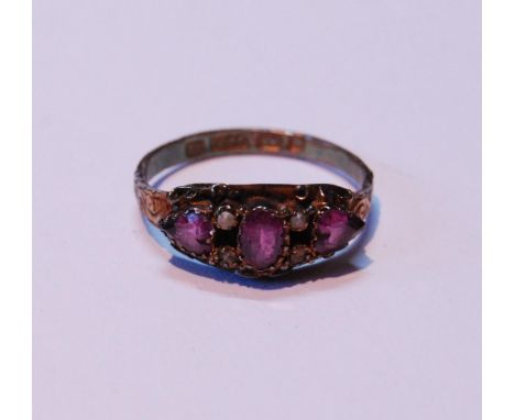 Late Victorian 15ct gold amethyst and seed pearl ring set with three amethysts interspersed by two rows of seed pearls, stamp