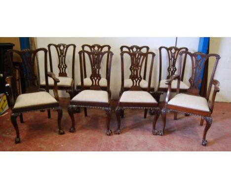 Set of eight Chippendale Revival mahogany dining chairs, including a pair of carvers, each with pierced splat, later upholste