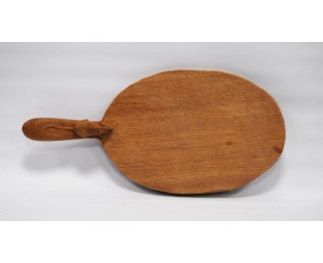 Robert 'Mouseman' Thompson of Kilburn (1876 - 1955) Oak oval cheese board with carved mouse signature to the handle, 37.5cm l