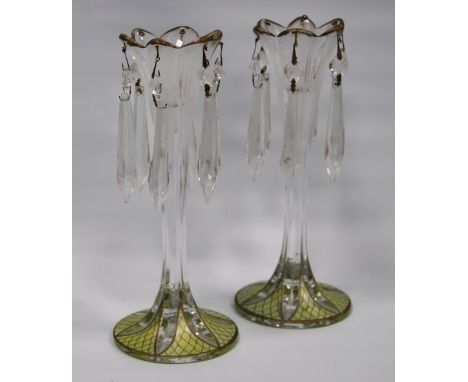 Pair of Bohemian-style glass and enamel lustres, each with tapered floral stem and six tear-shaped drops, on a green enamel f