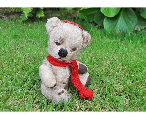 Toffee a Chad Valley Toffee teddy bear 1950s,  with light brown mohair, orange and black glass eyes, black stitched nose and 