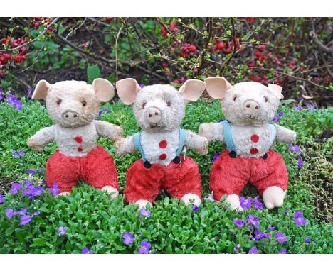 The Three Little Pigs three Chiltern artificial silk plush pigs 1950s, each with pink head and hands, orange and black plasti