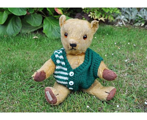 Norman a Chad Valley Magna teddy bear 1930s,  with golden mohair, replaced orange and black glass eyes, replaced black stitch