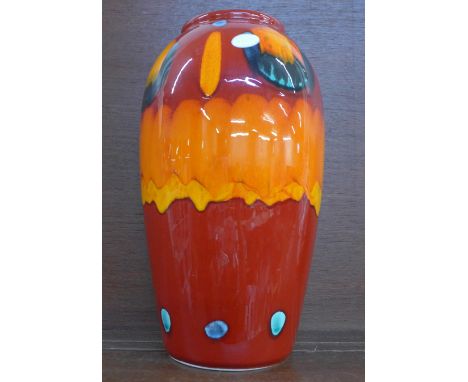 A large Poole pottery volcano Egyptian vase, 35cm 