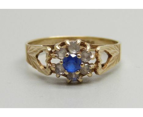 A 9ct gold, blue and white stone cluster ring, 1.8g, M 