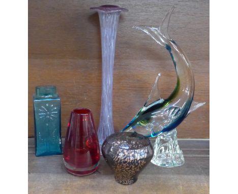 Five pieces of art glass, a Murano style fish, Whitefriars tapered ruby cased vase (9464), Dartington daisy vase (FT59), Cait