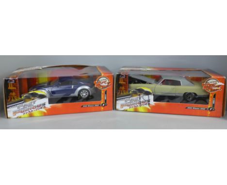 A 1/18 scale Fast and Furious model car, 2003 Nissan 350Z and one other in associated box 