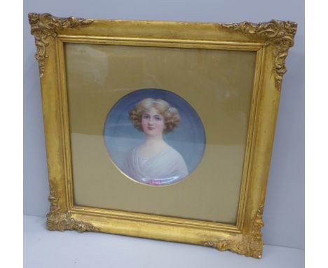 A gilt framed porcelain plate with hand painted portrait, signed Leslie Johnson 