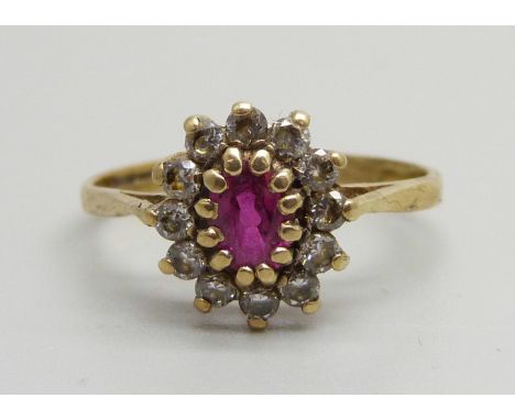 A 9ct gold, ruby and zircon cluster ring, 1.8g, N 