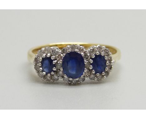 An 18ct gold, sapphire and diamond triple cluster ring, 3.5g, O 