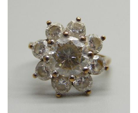 A 9ct gold and stone set cluster ring, 4.7g, N 