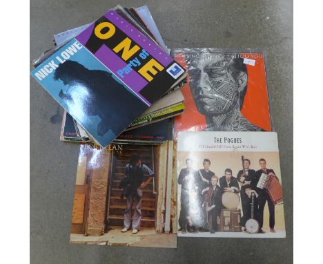 Forty-three vinyl LP records and three 12" singles, mix of genres, mostly rock and pop, artists including Rolling Stones, Bob