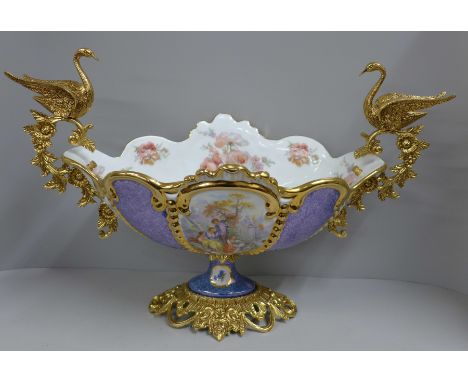 A modern continental gilt and ceramic table centrepiece, 52cm overall width 