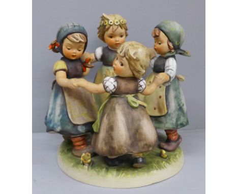 A Hummel figure group, Ring around the Rosie, dated 1957 to the base 