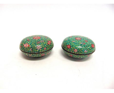 TWO CHINESE ENAMEL CIRCULAR LIDDED POTS  with painted six character mark to base, 8cm diameter