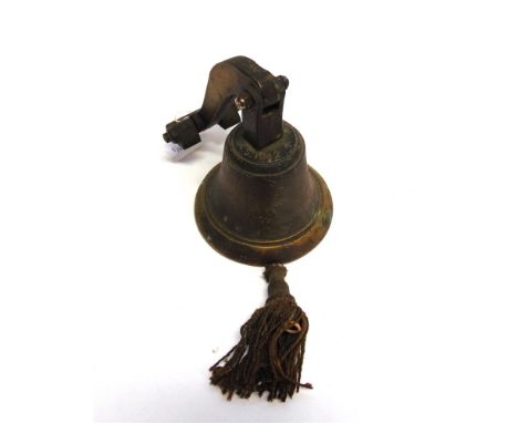 A BRASS BELL  the crown impressed 'A.S. 1942' and with arrow-head mark, complete with mounting bracket, approximately 15cm hi