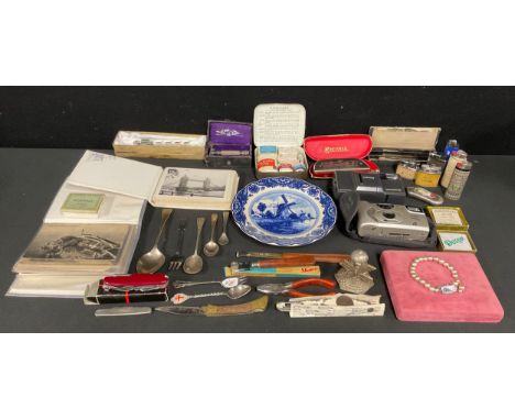 A mid 20th century Boots First aid kit,  Hohner Chrometta 8 Harmonica, pocket lighters, cameras, post cards etc