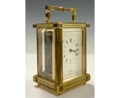 A brass carriage clock, by St James, London, 14.5cm high over handle