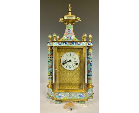 A Chinese cloisonne mantel clock, Roman numerals on circular white dial, twin winding holes, the case set with cloisonne pane