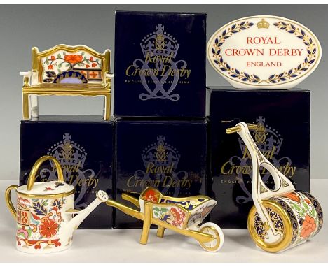 A Royal Crown Derby miniature model, Garden Bench, Pardoe pattern, first quality, boxed; others, Watering Can, Rich Japan pat