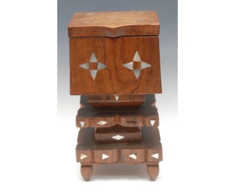 Tribal Art - a Polynesian hardwood rectangular treasure box, of stepped geometric 'totem' form, inlaid with mother of pearl l