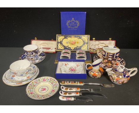 A Royal Crown Derby 2451 Imari pattern moustache cup and saucer, date code for 1905; a Samson Hancock cream jug and cover, 19