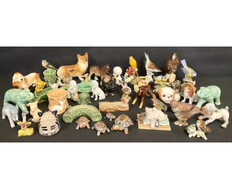 A collection of porcelain bird and animal models, including Beswick, Goebel, Sylvac, Crown Staffordshire, Wade, Aynsley, etc,