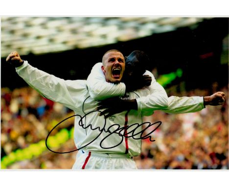 David Beckham signed 10x8 inch colour photo. Good condition. All autographs come with a Certificate of Authenticity. We combi