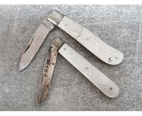 2 mother of pearl handled fruit knives, one with hallmarked silver blade