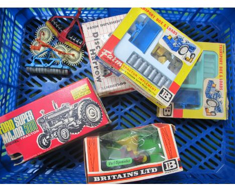 A Britian's Ford Super Major Tractor, missing small parts, contained in original poor box, plus various farm accessories,