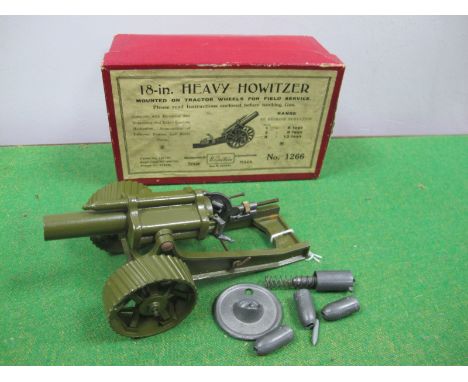 A Britains Mid XX Century 18inches Heavy Howitzer, mounted on tractor wheels, olive finish. Appears unbroken, with shells. Ap