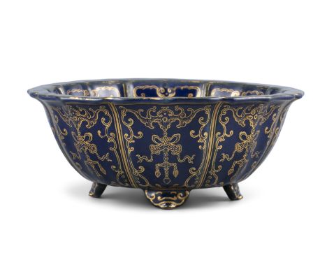 A GILT ENAMELED POWDER BLUE PORCELAIN PLANTER OF OCTOFOIL FOLIATE SHAPE CHINA, POSSIBLY QING DYNASTY It rests on four lingzhi