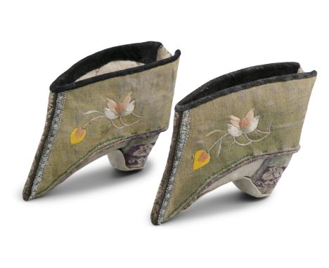 *A PAIR OF EMBROIDERED SILK LADY SHOES, QIXIE 旗鞋 CHINA, LATE QING DYNASTY, 19TH CENTURY Finely embroidered in bright colors w