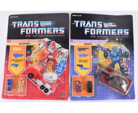 Two Original Carded Hasbro G1 Transformers, Targetmaster Autobot Quickmix and  Targetmaster  Deception Quake 1987 issues tran