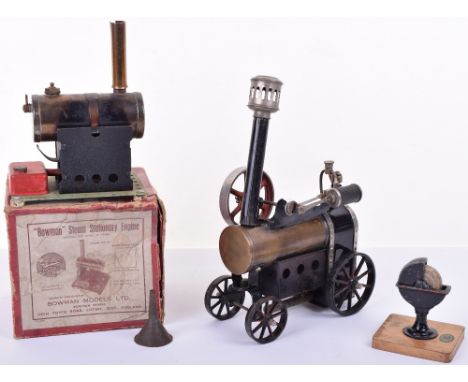 A Doll & Co Portable Steam engine, with copper boiler and twin wick burner, water gauge, whistle, chimney, mounted single cyl