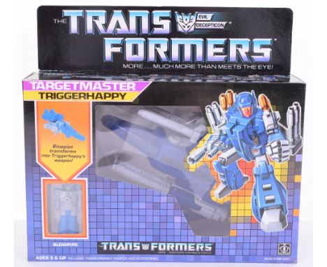 Boxed Hasbro G1 Transformers Target Master ‘Triggerhappy’ 1986 issue, transforms from jet to robot and back in mint boxed com