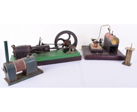 A horizontal live steam model of a Mill Engine, green painted cast base with mounted wood clad cylinder, valve chest, gear le