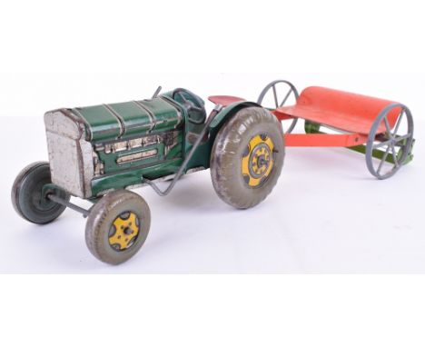 Mettoy  TinplateTractor and Plough, green tinplate tractor,red seat, with green/red tin plate plough, in fair to good conditi