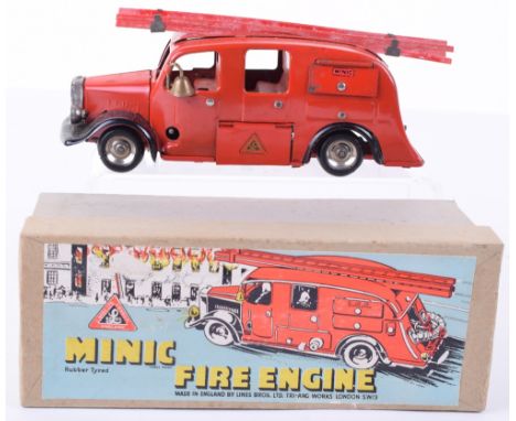 Minic  62M Fire Engine, boxed Fire engine with bell, ladder and hose attachments, good condition slight paint loss to hinged 