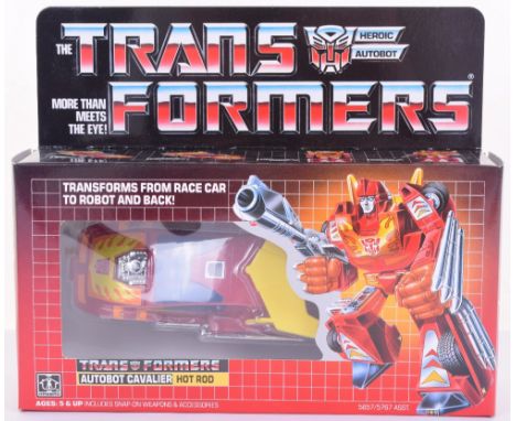 Boxed Hasbro G1 Transformers Autobot Cavalier ‘Hot Rod’ 1986 issue, transforms from race car to robot and back in mint boxed 