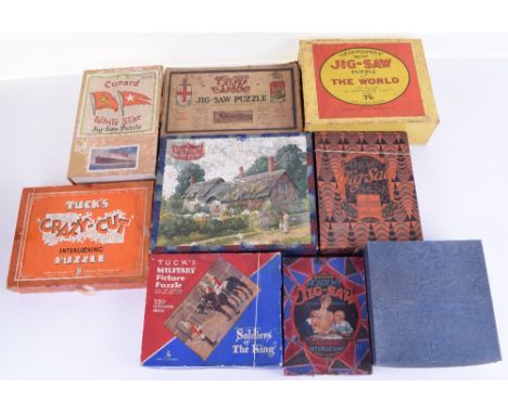 Collection of eight complete Jigsaw Puzzles, seven complete puzzles including Chad Valley GWR King George V about 150 piece s