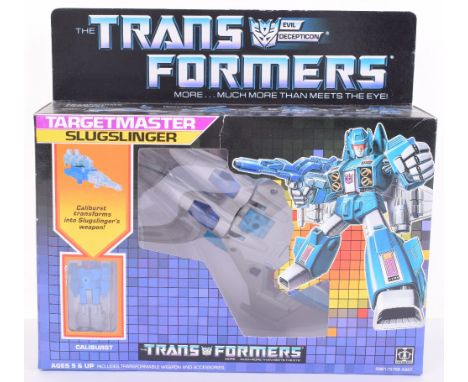 Boxed Hasbro G1 Transformers Target Master ‘Slugslinger’ 1986 issue, transforms from jet to robot and back in mint complete u