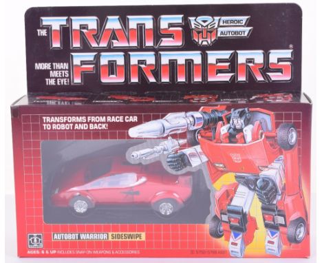 Boxed Hasbro G1 Transformers Autobot Warrior ‘Sideswipe’ 1984 issue, transforms from race car to robot and back in mint boxed