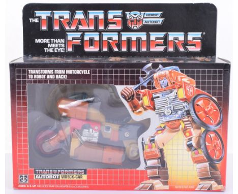 Boxed Hasbro G1 Transformers Autobot ‘Wreck-Gar’ 1986 issue, transforms from motorcycle to robot and back! In mint boxed comp