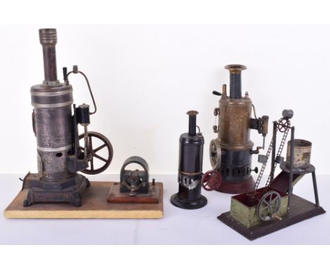 Bing vertical steam engine, with side mounted cylinder and flywheel, mounted on a wooden base with a dynamo, 13” (33cm) high,