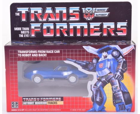 Boxed Hasbro G1 Transformers Autobot Warrior ‘Tracks’ 1985 issue, transforms from race car to robot and back in mint boxed co