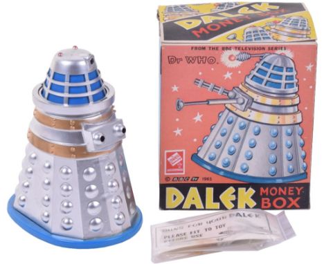 Very Rare Codeg Dr.Who Dalek Money Box, circa 1965, silver/gold/blue plastic body, guns and instruction leaflet still in seal