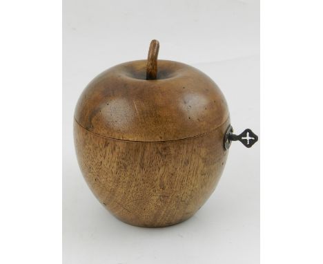 A fruitwood tea caddy in the form of an apple. 