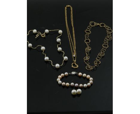 A pearl necklace with gold links, together with pearl bracelet and two other items.